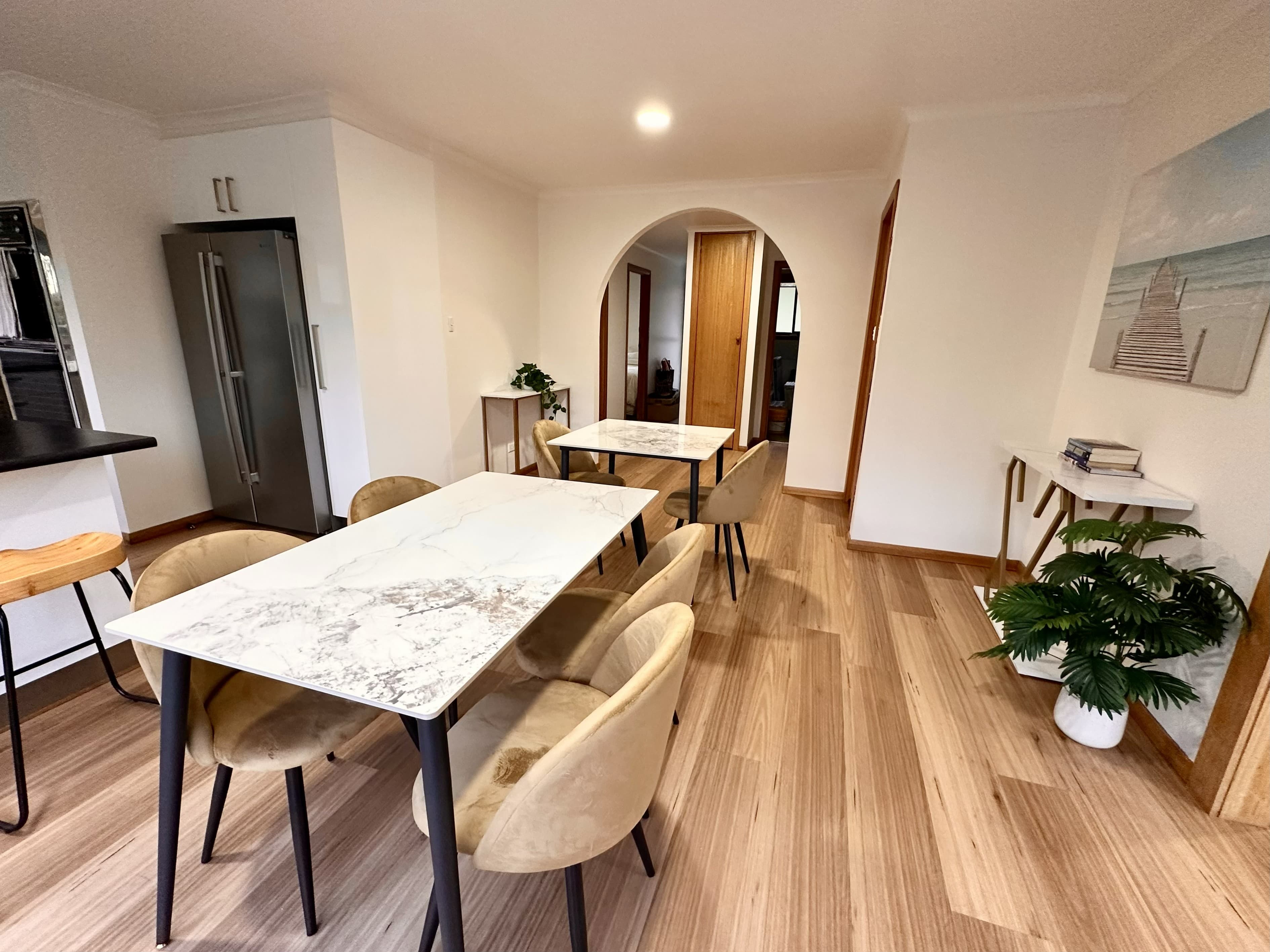 LunaStay — marble dining table in the open plan kitchen and living area